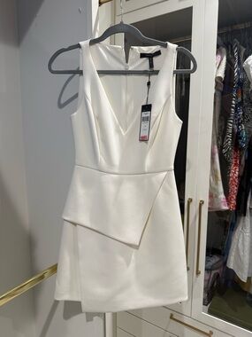 BCBGMaxAzria White Sleeveless Peplum Mini Dress